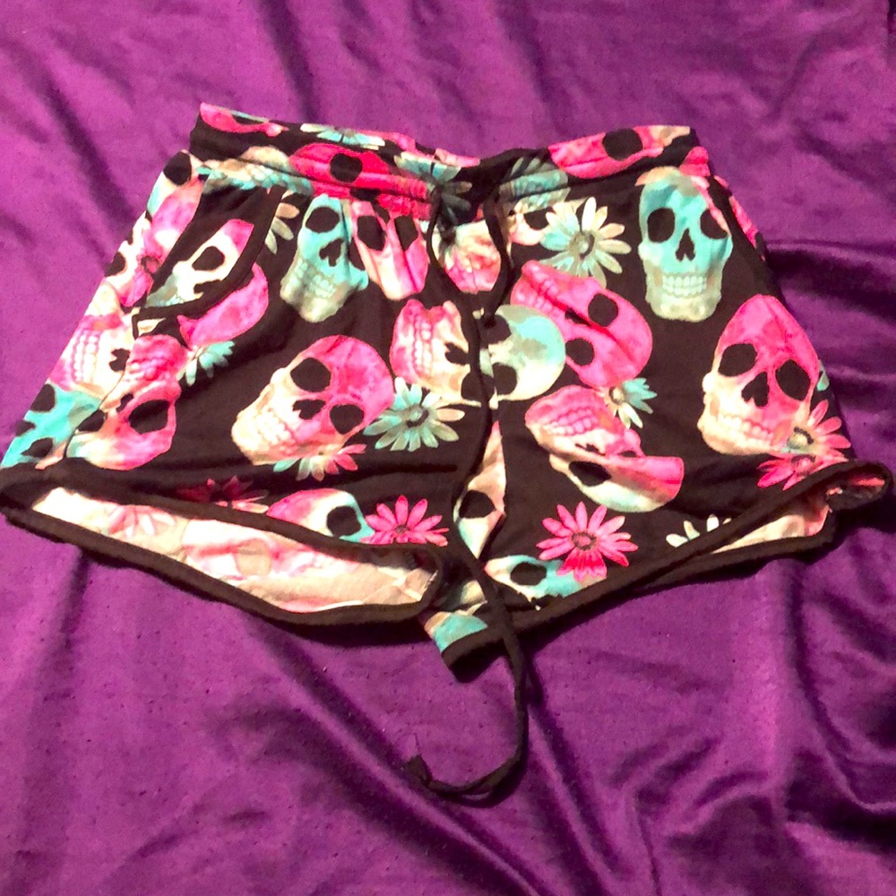 Blue and pink skull dolphin shorts